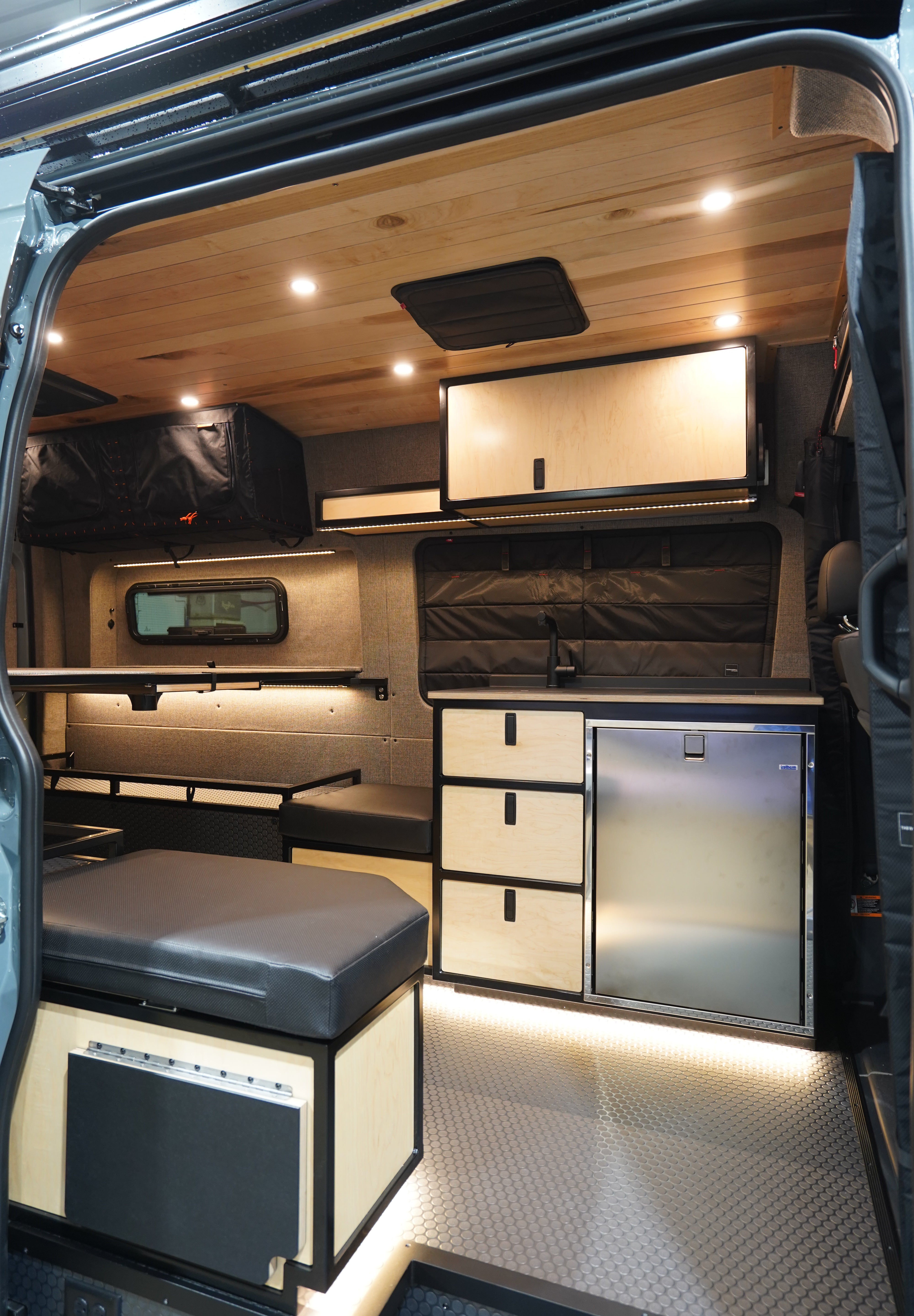 Interior of a compact vehicle with wooden paneling 